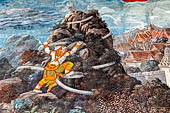 Bangkok Grand Palace, Ramakien murals of the gallery of the Wat Phra Kaew, Hanuman using his tail to coil around Mount Saphaya in search of Sangkoranee and Treechowa herbs. 